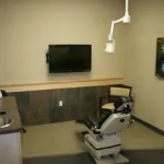 Operating room with dental chair and TV