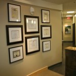 Wall with Dr. Verschueren's degrees and certificates